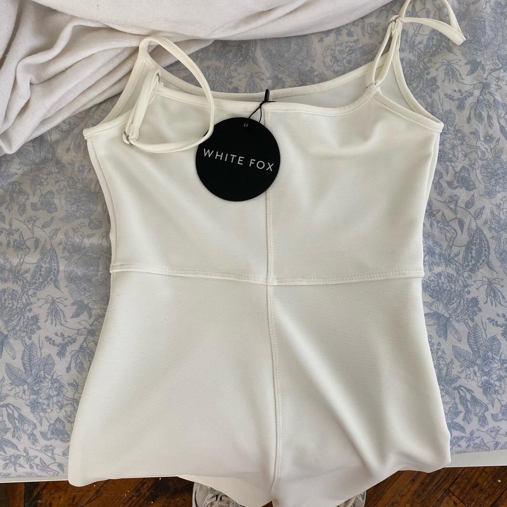 Brand new white fox bodysuit